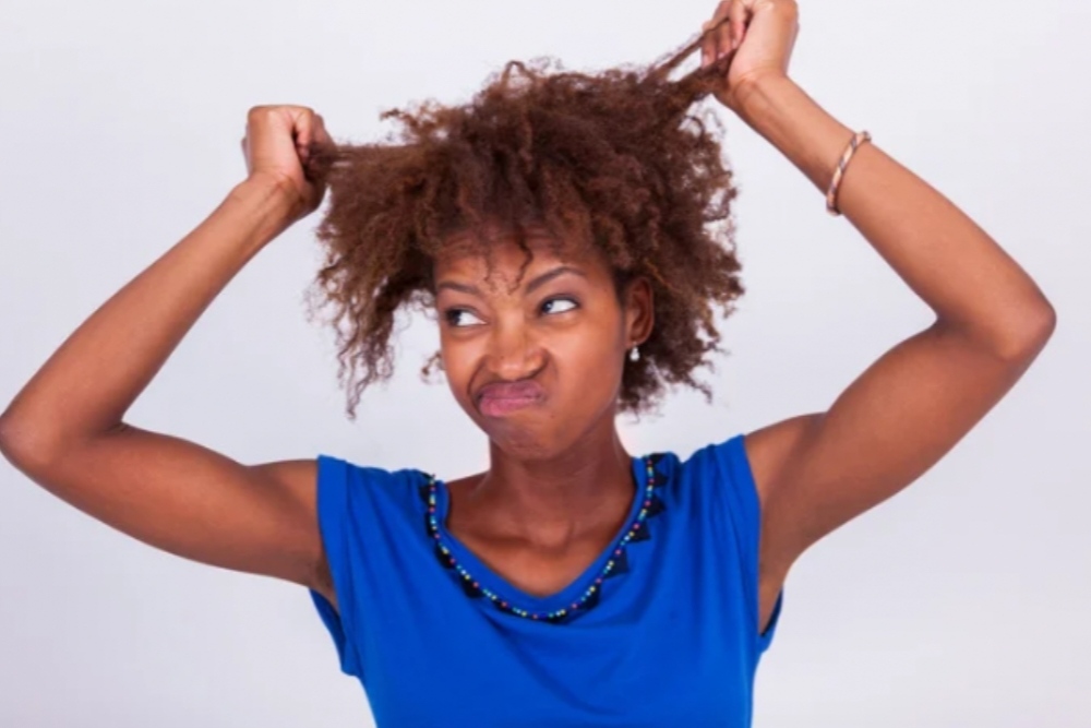 Girl Stretching her hair with her hand